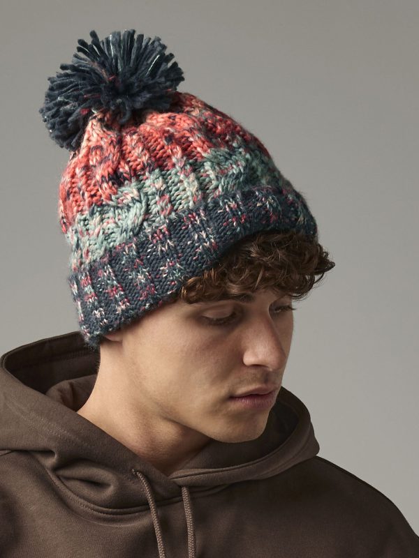 Corkscrew pom pom beanie