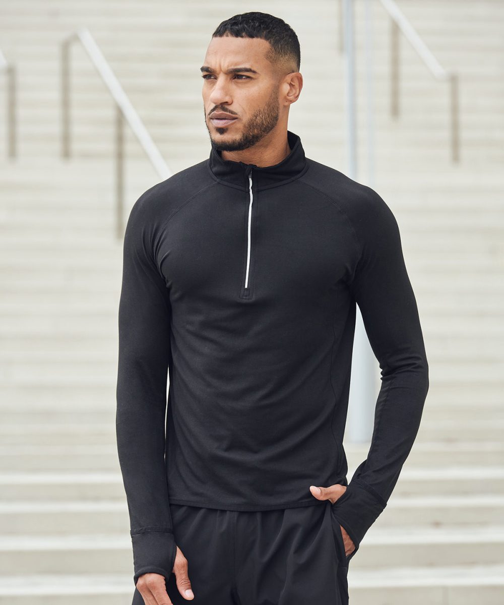 Long-sleeved ¼ zip top