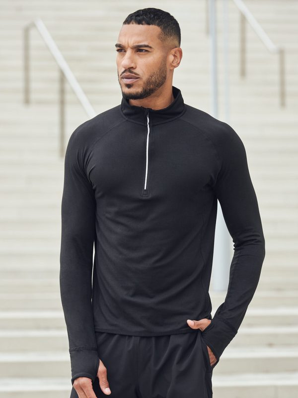 Long-sleeved ¼ zip top